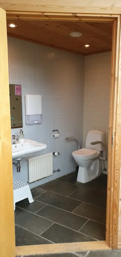 Viser døropning til handikap toalett