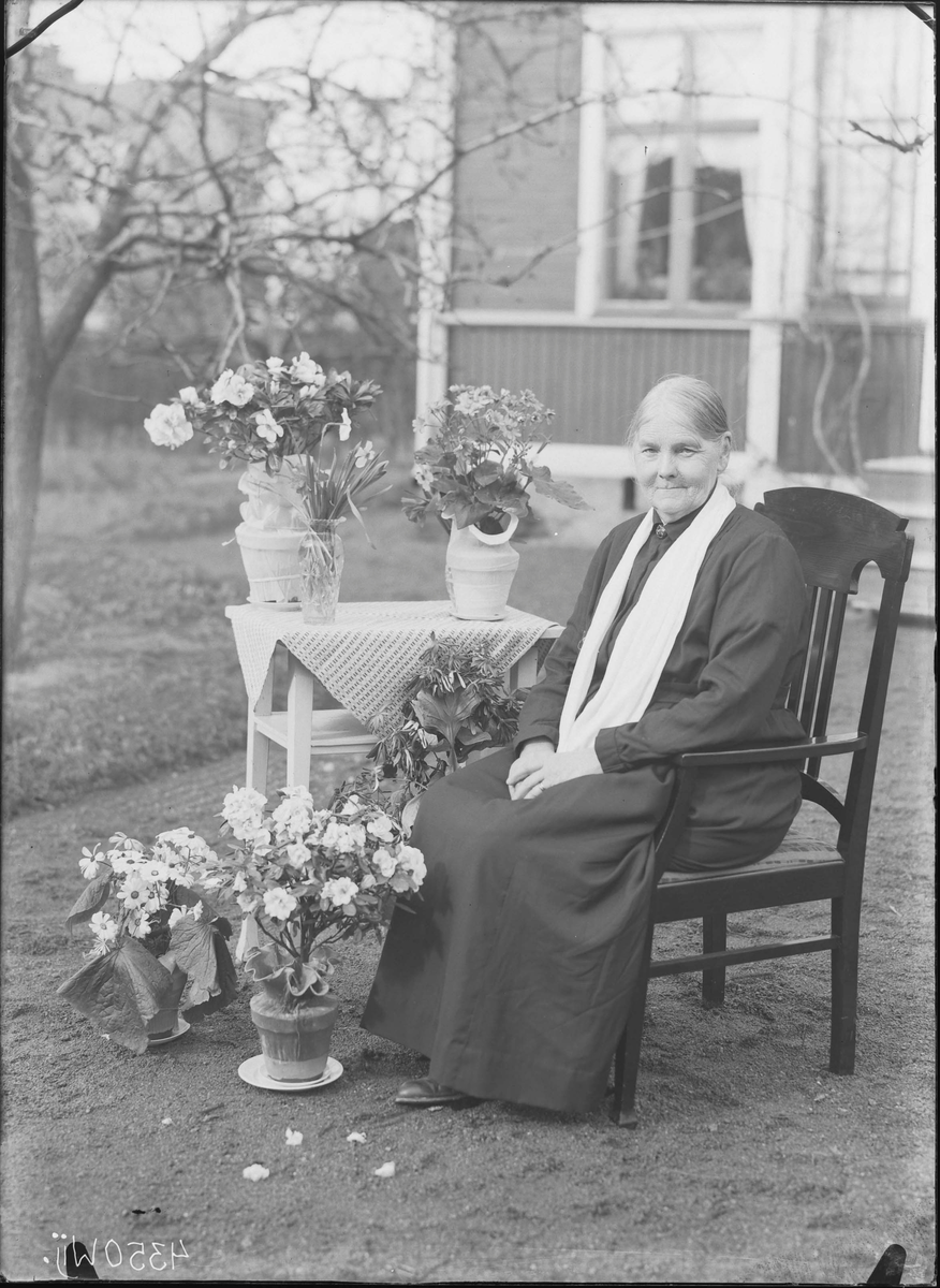 Fotografering beställd av Daun. Hon är ej identifierad.