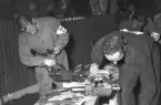 Hantverkstävling på Rotundan den 2 april 1950. Smidesarbete uppvisas.