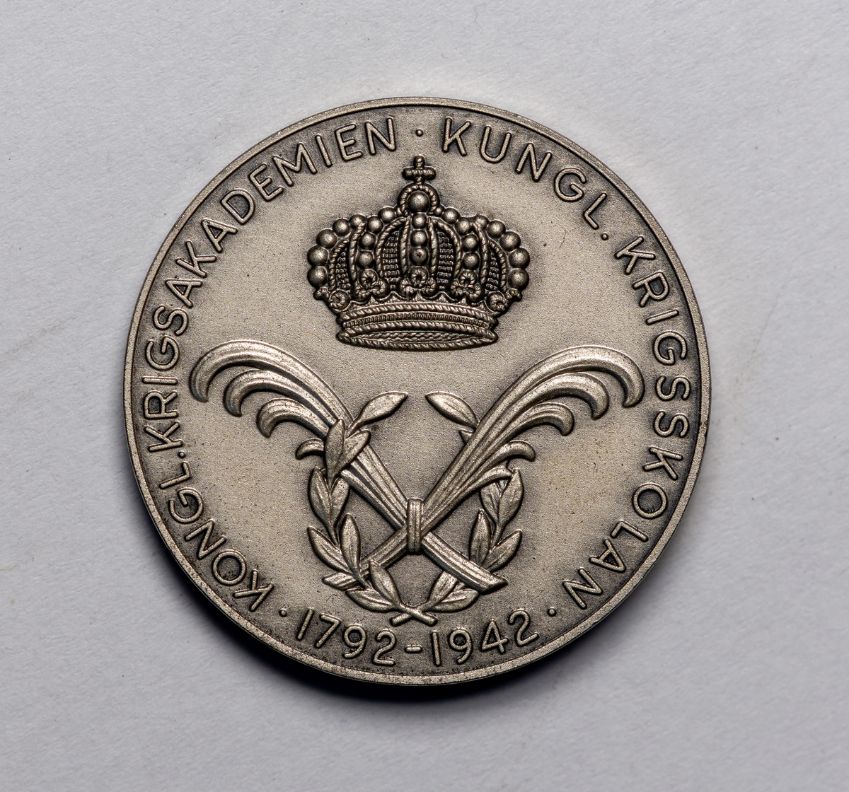 Minnesmedalj. Diameter= 3 cm.Kungl.Krigsskolan.