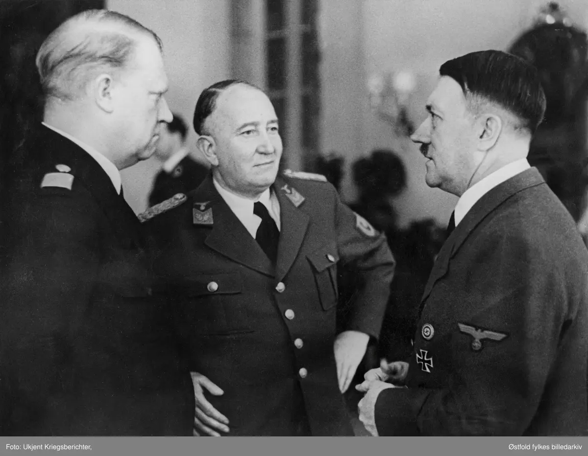 Tyske propagandabilder fra andre verdenskrig. Fra venstre: Vidkun Quisling, Albert Viljam Hagelin og Adolf Hitler. Berlin,februar 1942.