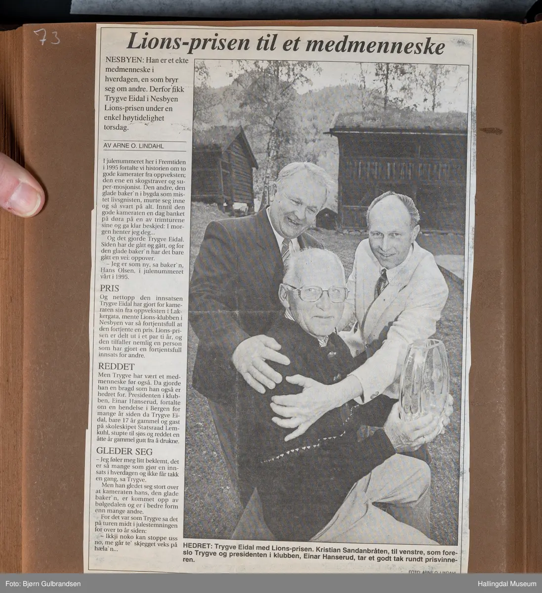 Et brunt læralbum med 74 sider med tekst og bilder. Laget av Lions Club Nesbyen.   