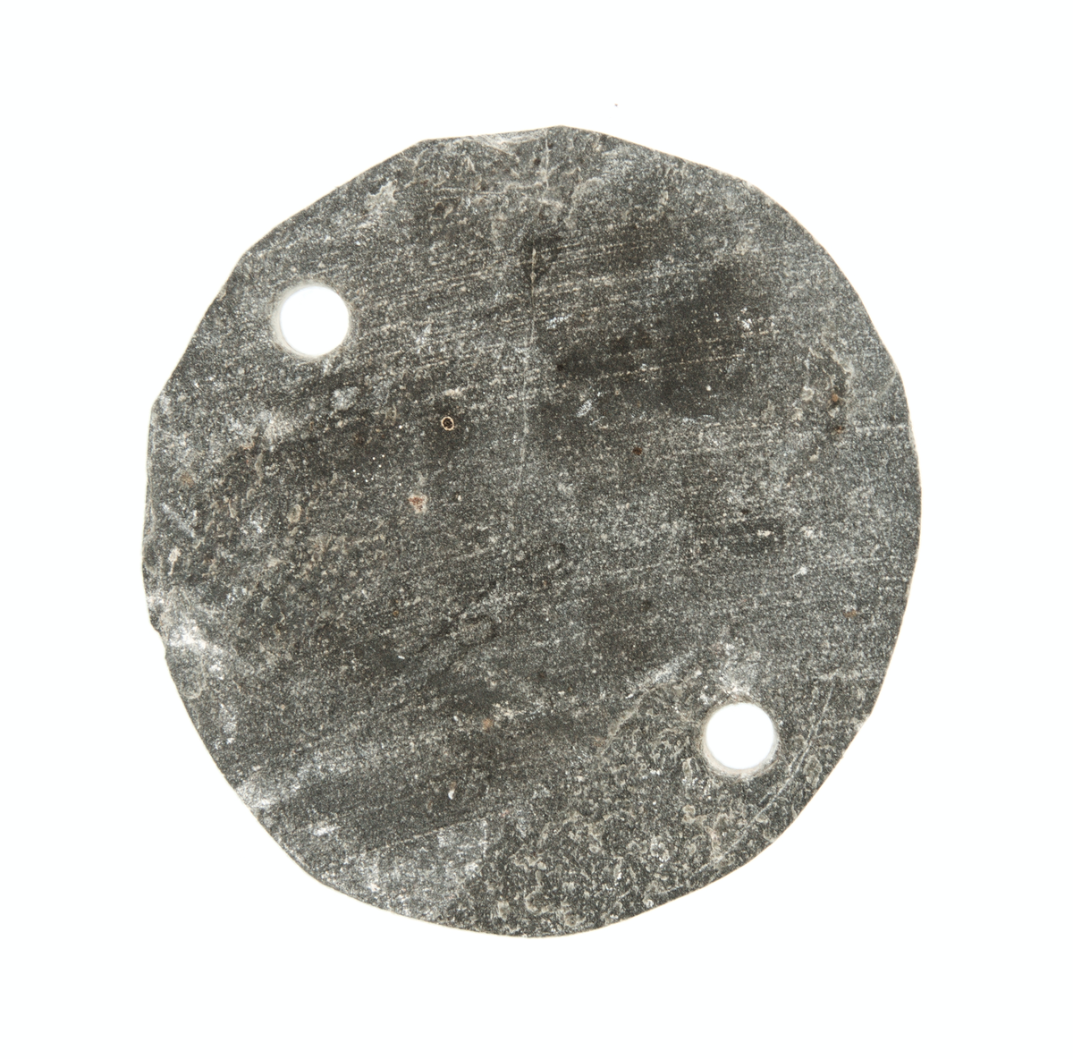 Sirkelforma steinplate.