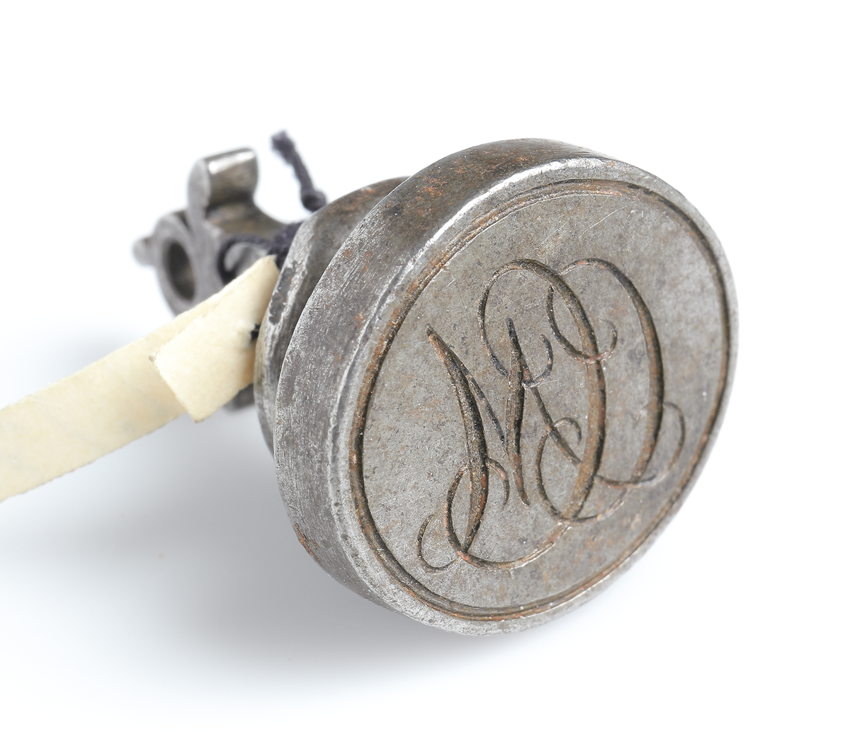 Sigillstamp av järn med initialerna "C.C.M".