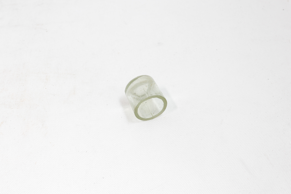 Liten krukke av glass.