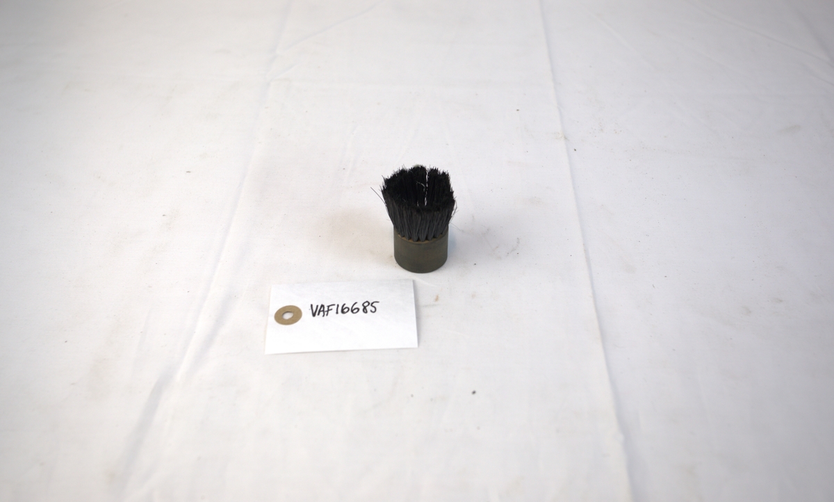 Poleringsbørste brukt i gullsmedvirksomhet.