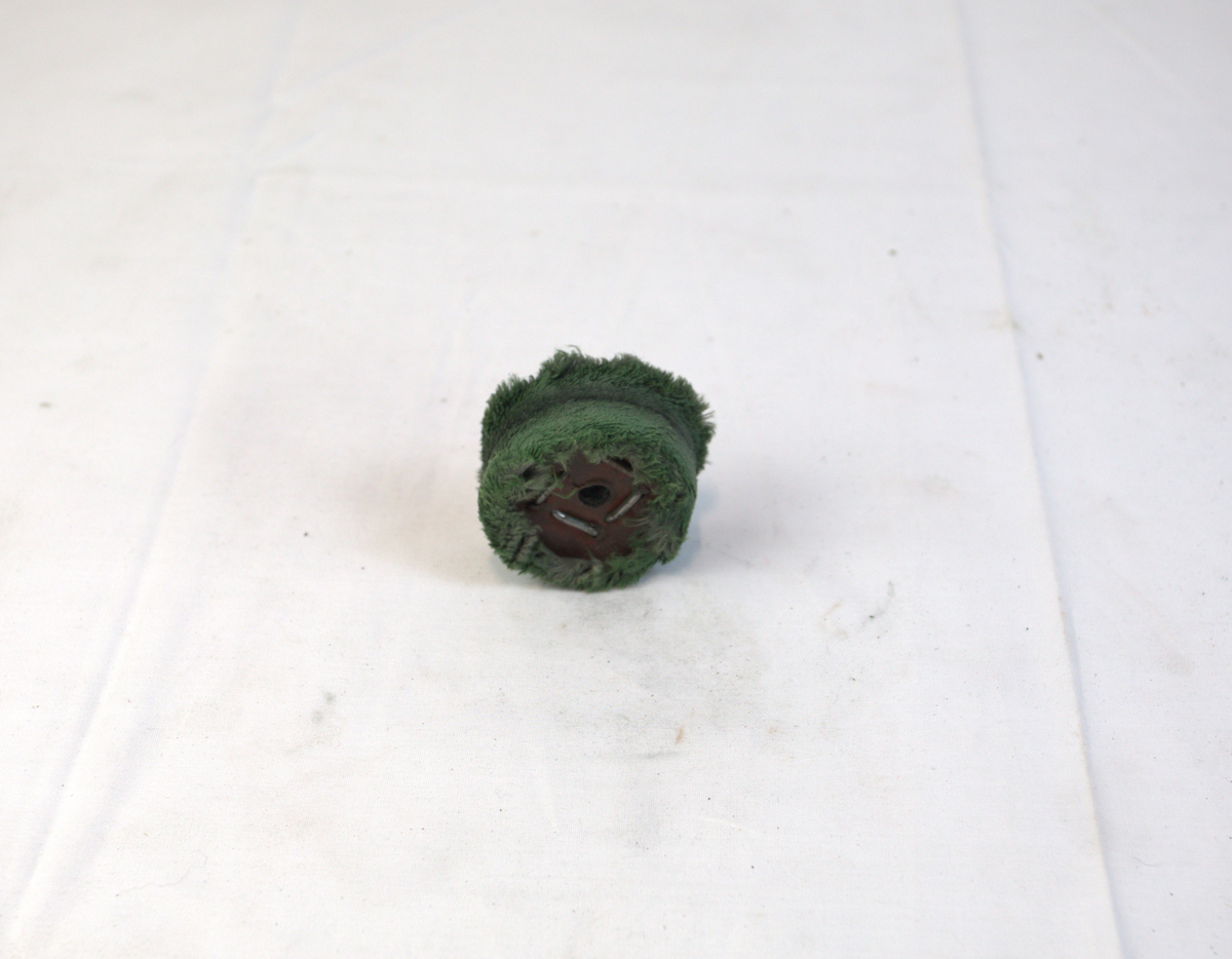 Polerstikkel med myk børstekant brukt i gullsmedvirksomhet.