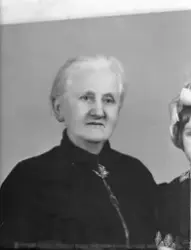 Kvinna