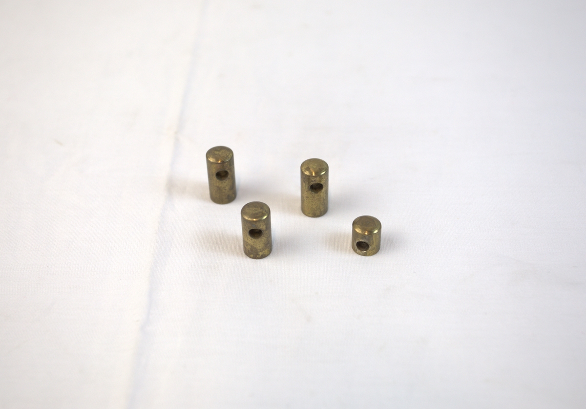 Trolig aksel i messing (?) brukt i gullsmedvirksomhet. 