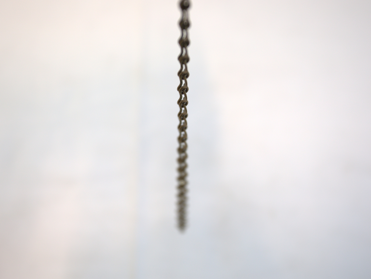 Messinglenke, eksempelvis til armbånd eller lenke til ur. Det er laget med små ringer som er hektet i sammen.