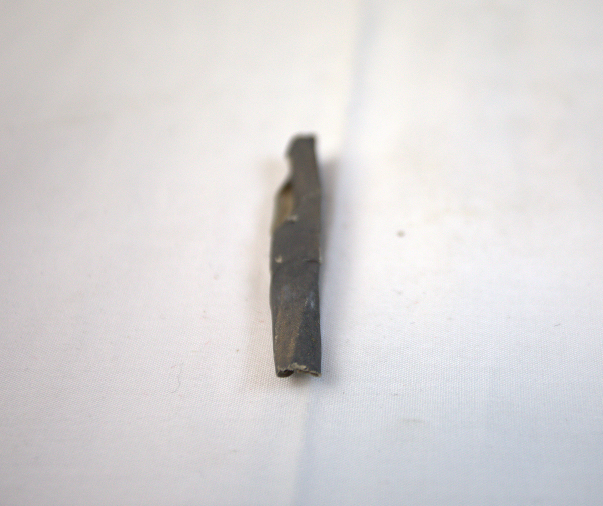 Bit av sandpapir brukt i gullsmedvirksomhet.