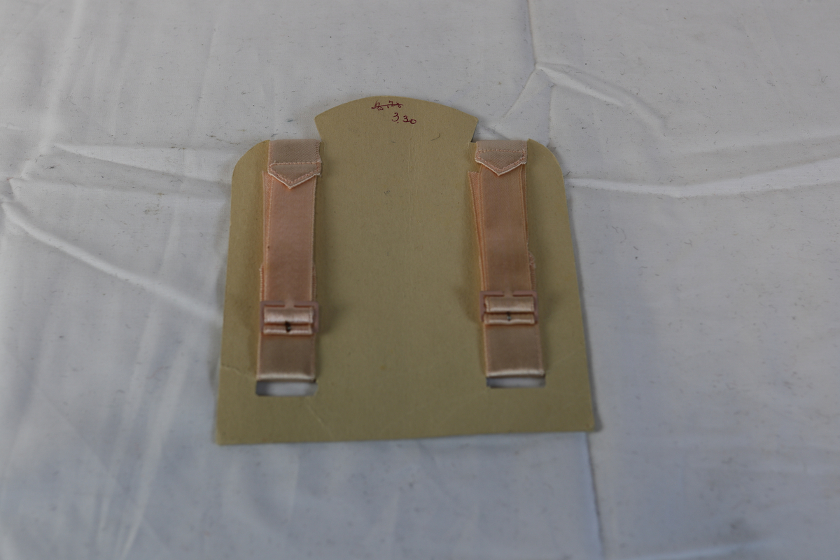 Bånd til skuldre i rosa farge.