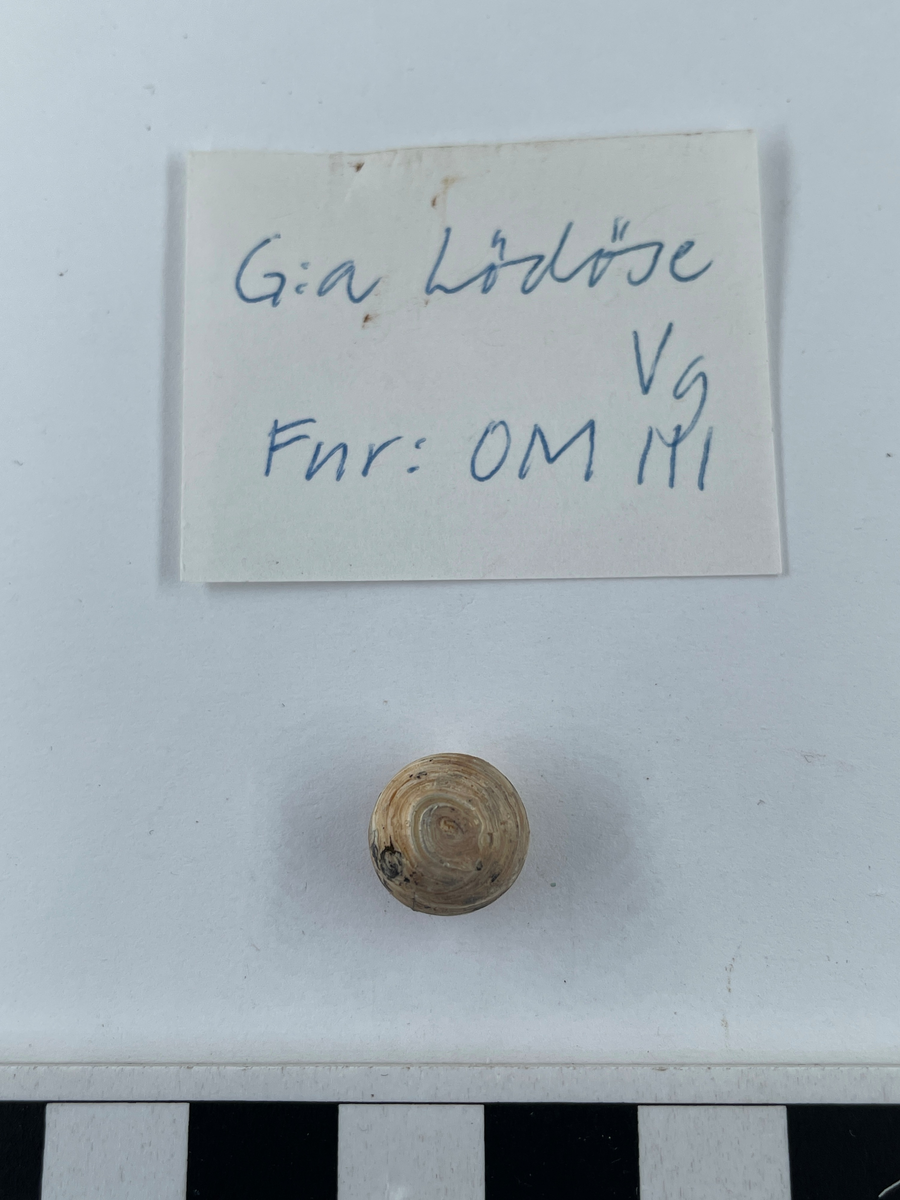 Pärlformad.