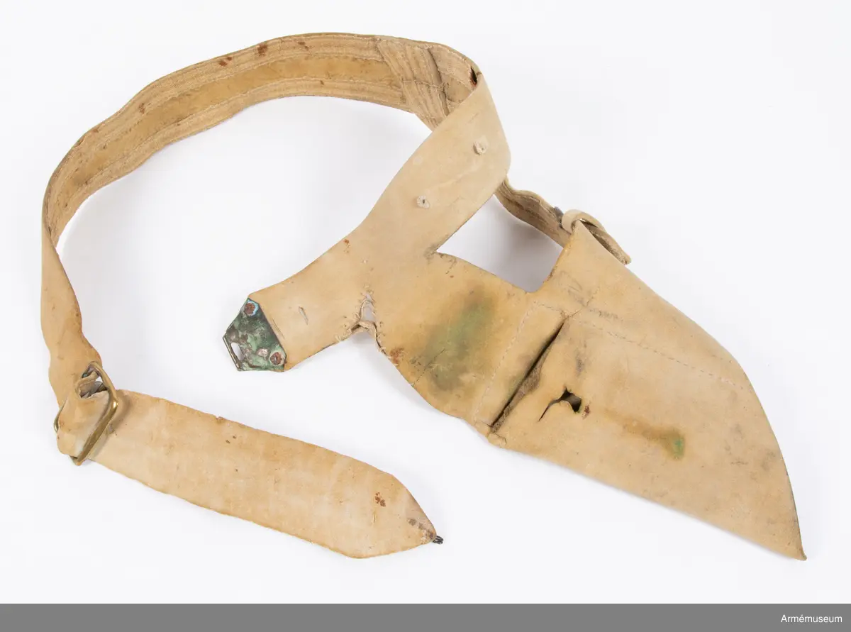 Livgehäng av gult sämskat läder med två mässingsspännen.