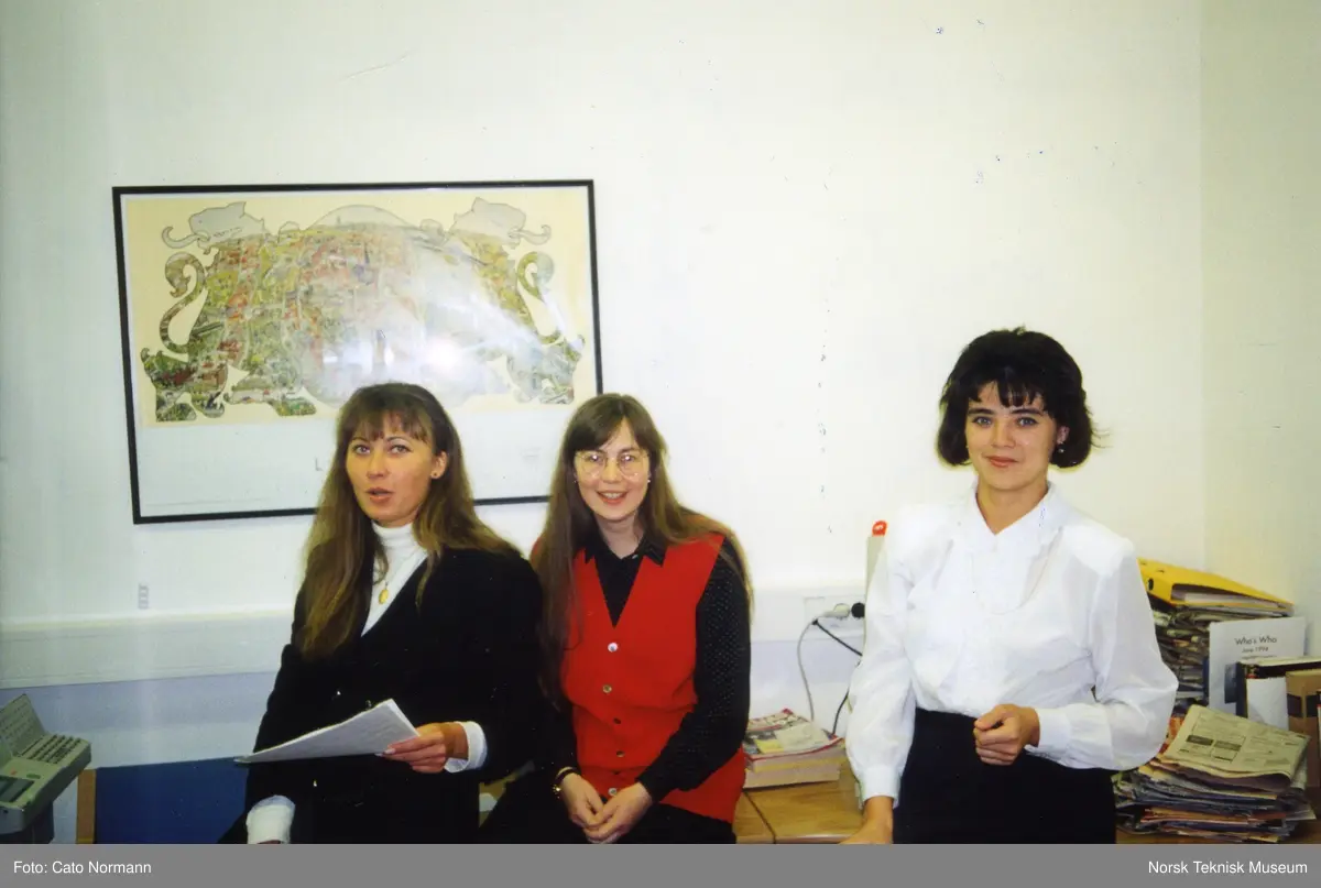 Tre medarbeidere i Riga