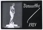 Kort på en staty av en kvinna och att resan nu går till Versailles, 1921.
