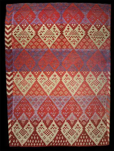 Täcke med hjärtan stickat av Märta-Stina Abrahamsdotter