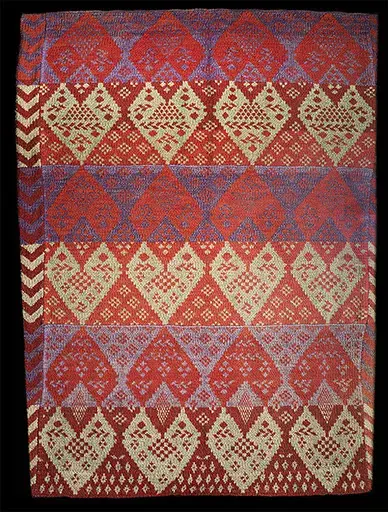 Täcke med hjärtan stickat av Märta-Stina Abrahamsdotter