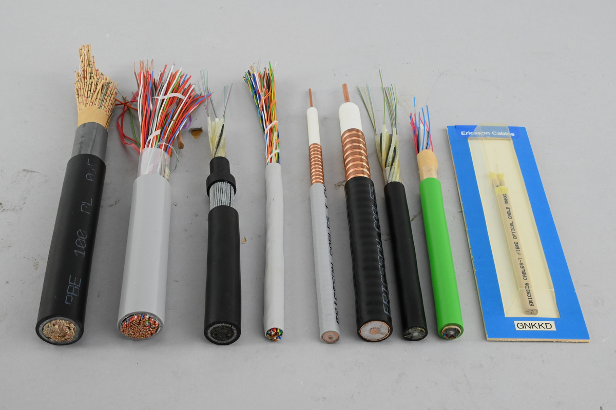 Låda med 9 kabelprover, från slutet av 1900-talet.