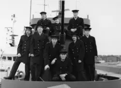 Besättnig uppställda på däck