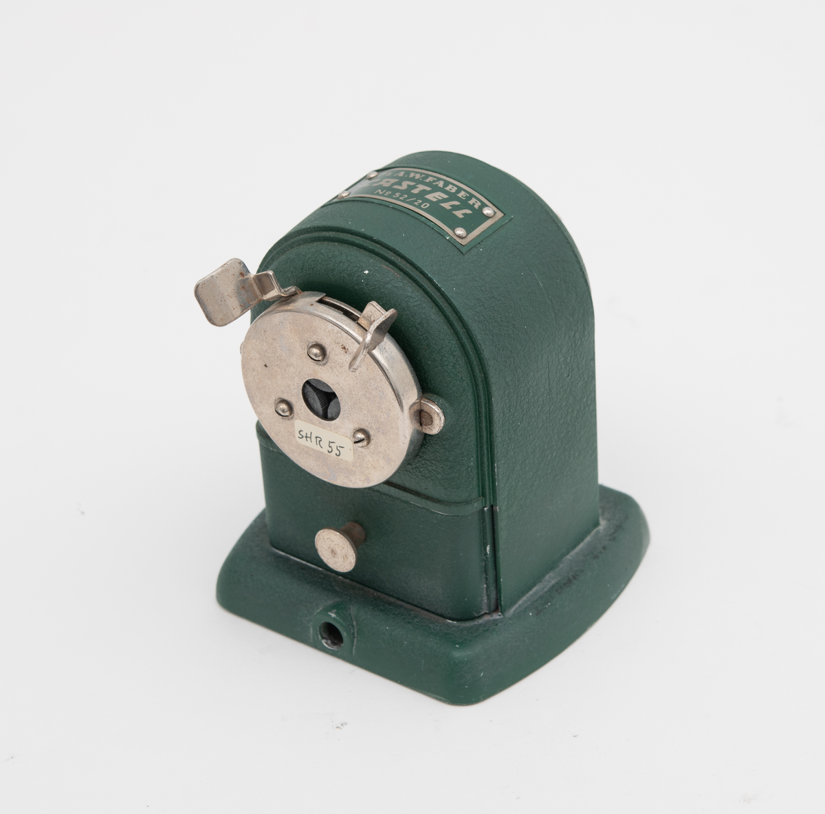 Grønn blyantkvesser med sveiv og skuff.