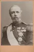 Kungaporträtt av Oscar II, kung av Sverige från 1872-1907 och kung av Norge från 1872-1905. Text på baksida kort: 