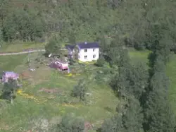Flyfoto over Sørreisa. Sannsynligvis over gården "Aker" på G