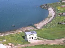 Flyfoto over Sørreisa kommune i 1961. Samvirkelaget ved Grun