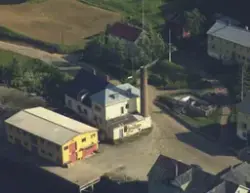 Flyfoto over Sørreisa kommune i 1968. Meieri i Nordstraumen,