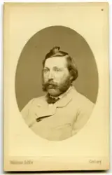 Porträtt på en man.