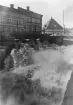 Vårflod vid Kvarndammen. Foto troligen några årtionden in på 1900-talet, Söderhamn.