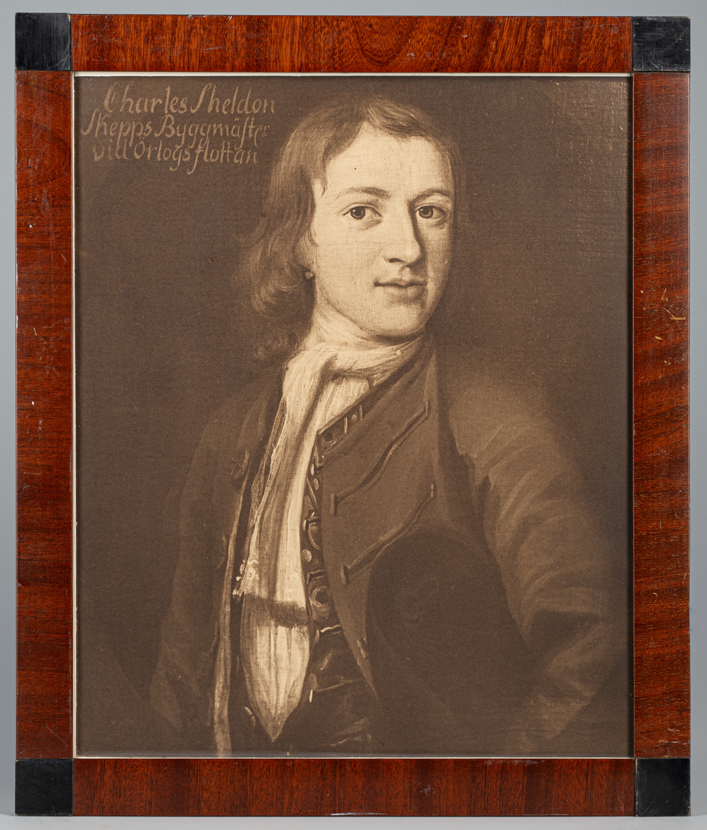 Fotografi i glas och ram av porträtt av skeppsbyggmästare Charles Sheldon.