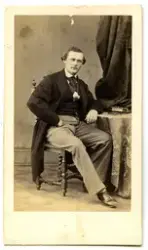 Porträtt på en man.