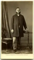 Porträtt på en man.