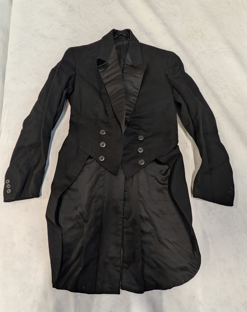 Jakke med lang snipp.