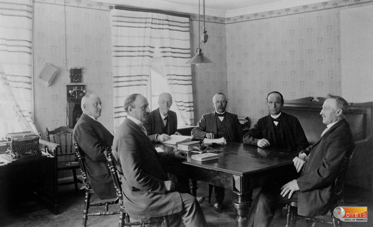 Sex män i Sammanträde