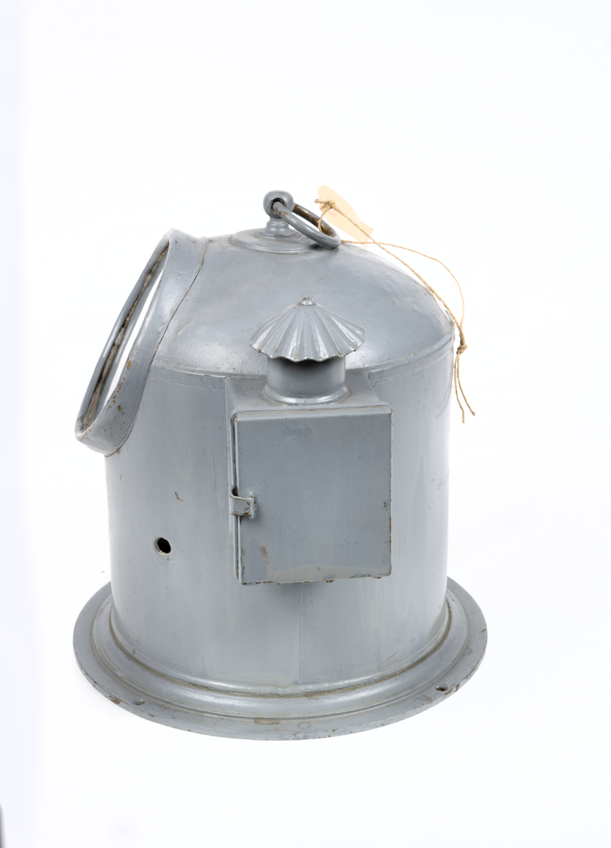 Runt nakterhus med sidorum för veklampa.