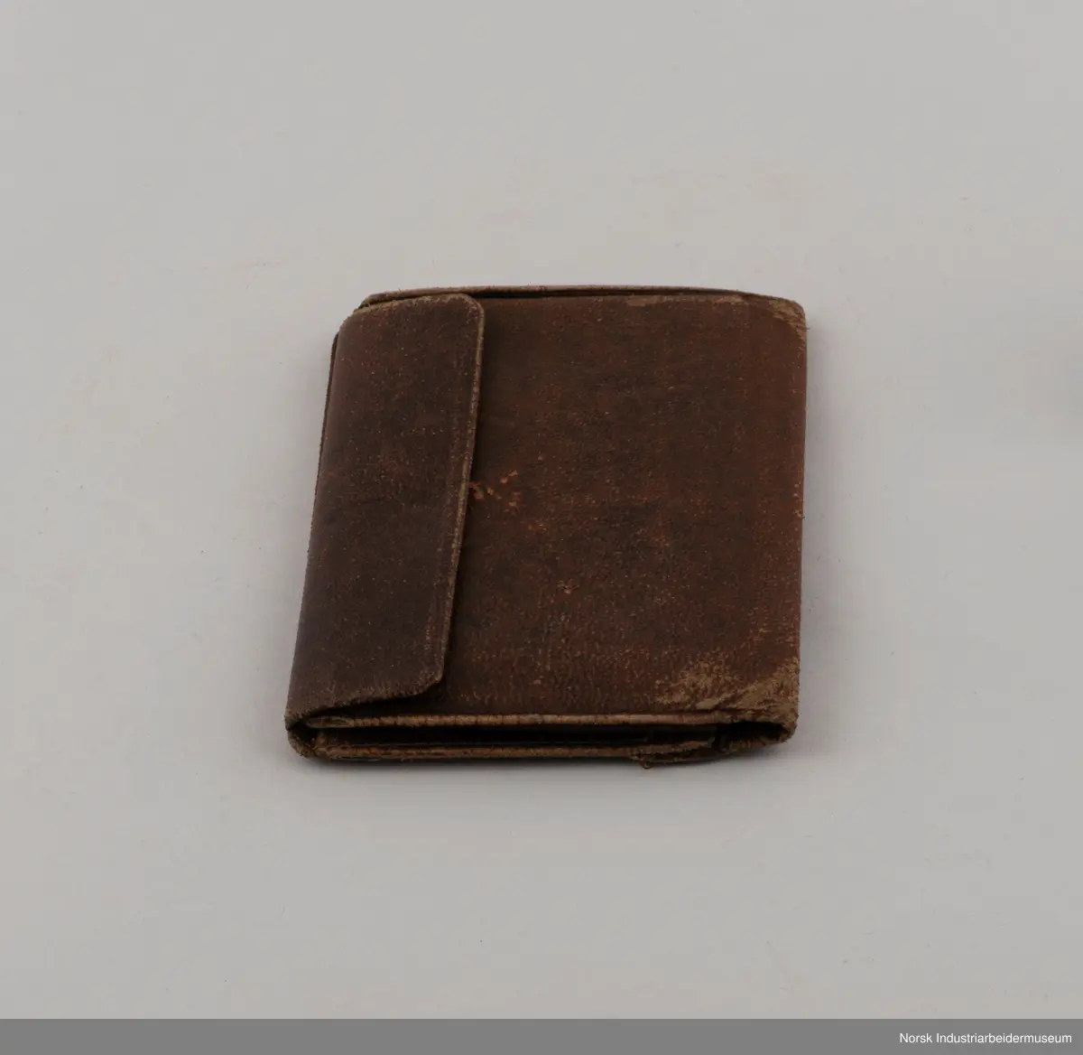 Rektangulær lommebok i lær.