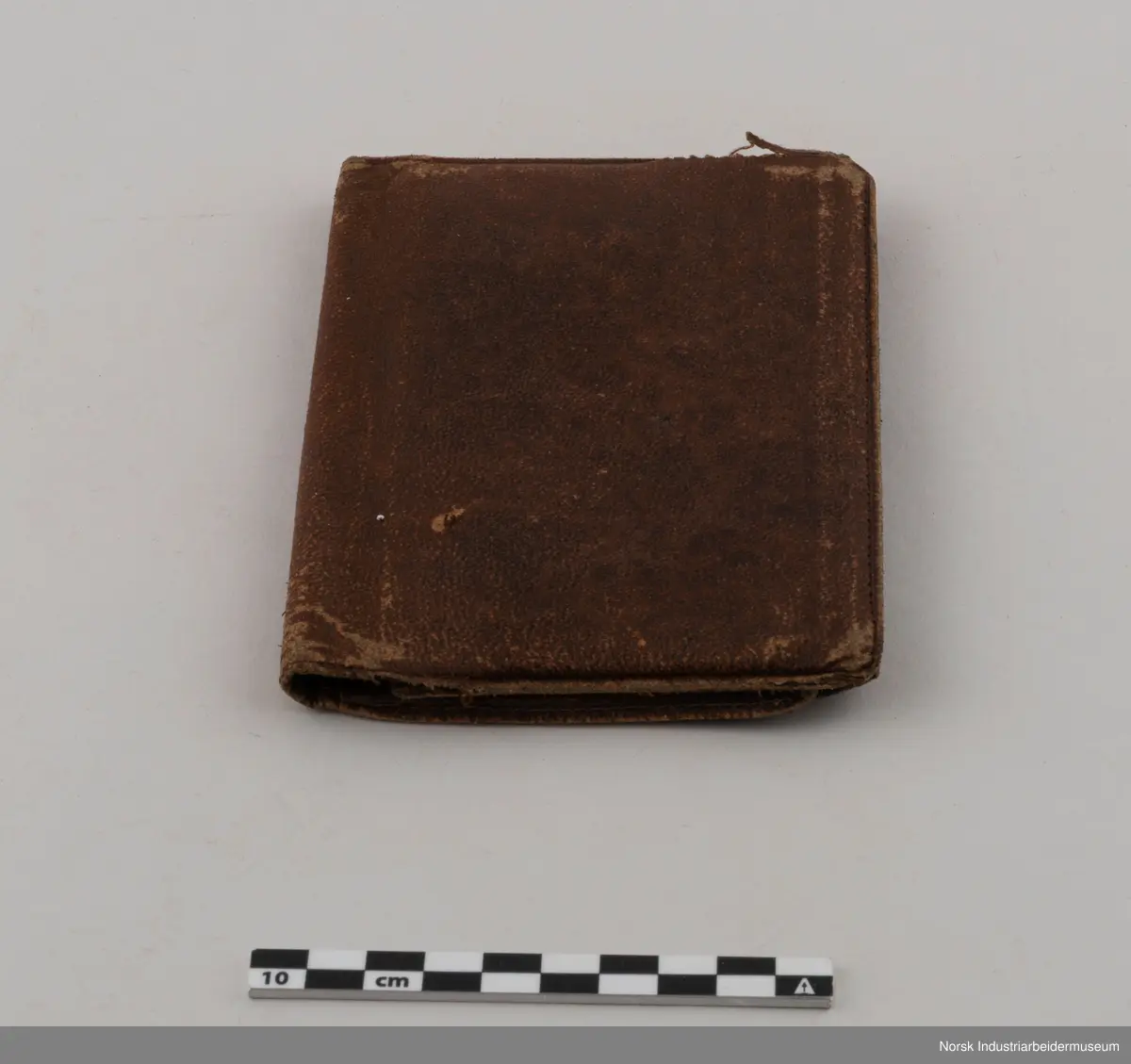 Rektangulær lommebok i lær.