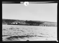 Landskapsbilde med flere gårder