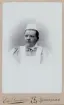 En kvinna i sjuksköterskeuniform med hätta. 
Bröstbild, halvprofil. Ateljéfoto.
Fröken Sally Eksandh, sjuksköterska vid lasarettet i Söderhamn 1894-1905.