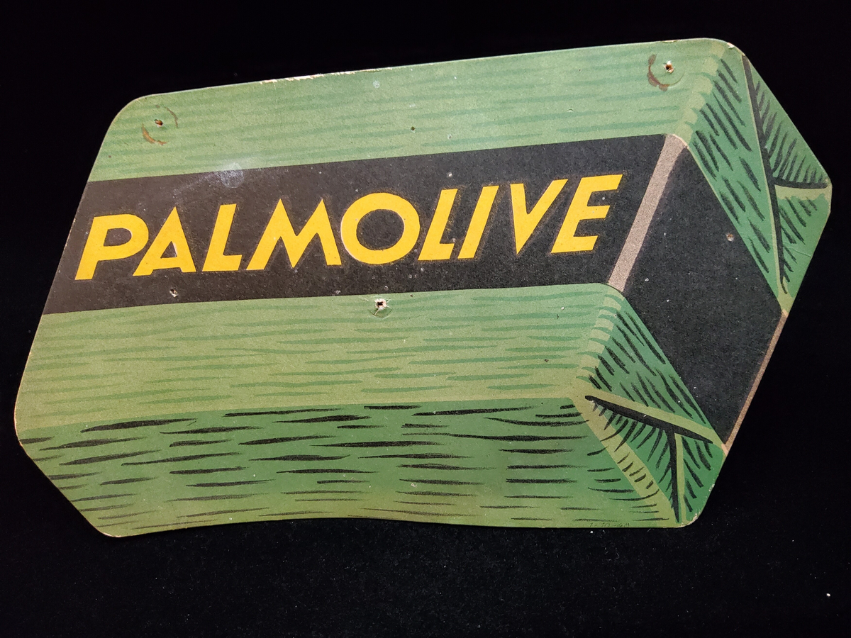 Reklamskylt  av papp. Palmolive.