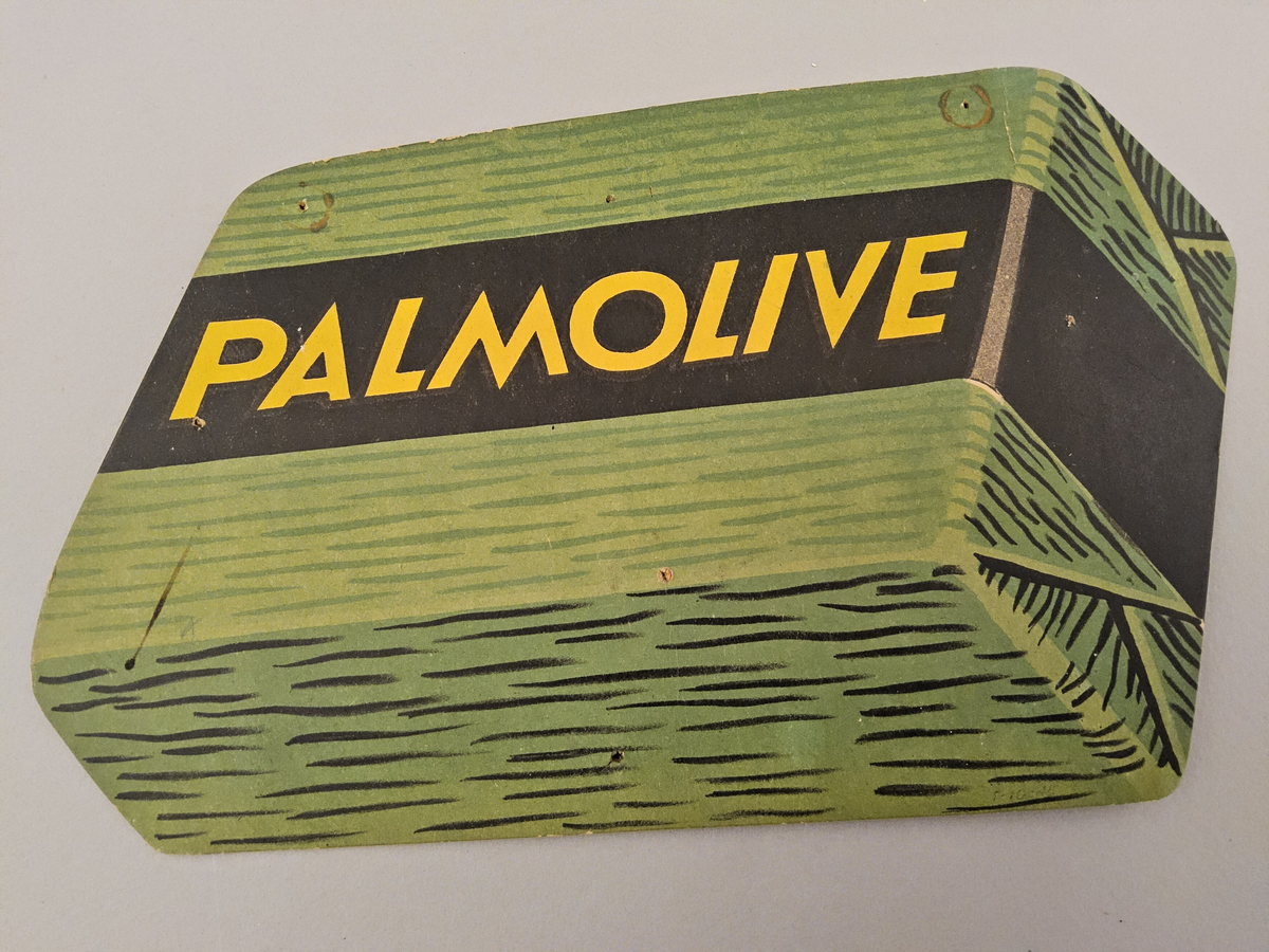 Reklamskylt  av papp. Palmolive.