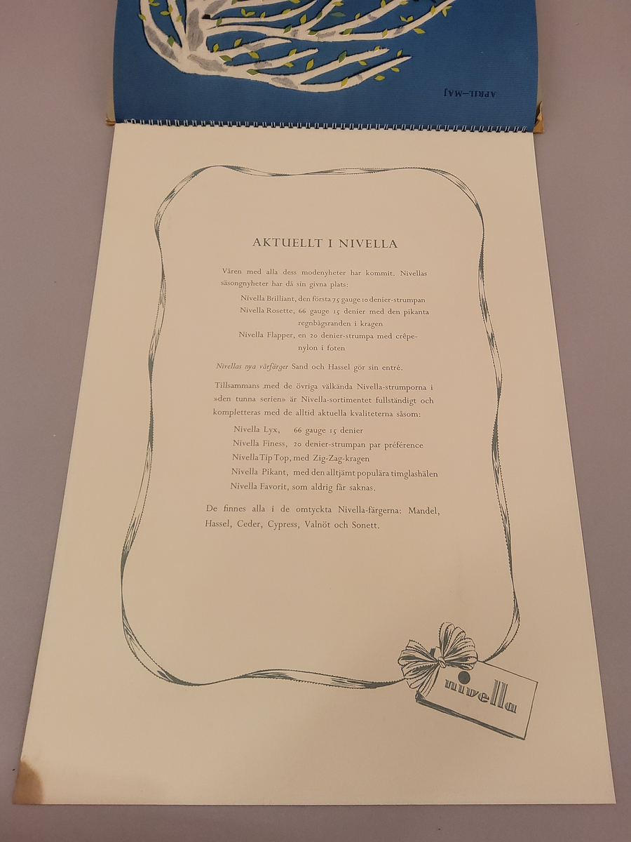 Reklam, almanack-tavla för reklam av Nivella barnstrumpor.