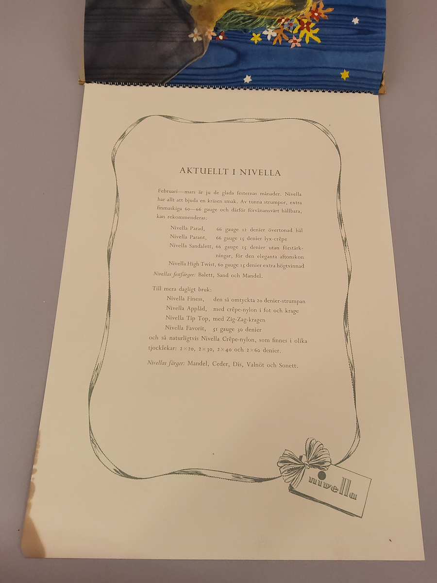 Reklam, almanack-tavla för reklam av Nivella barnstrumpor.