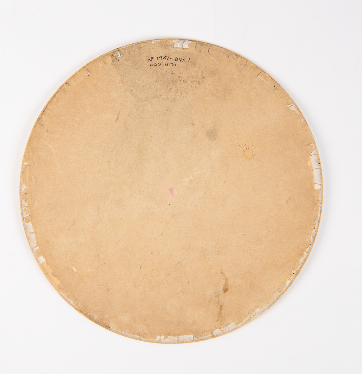 Sju plater til fenakistoskop. En plate er forside og en blank plate kan være baksiden. Det er fem plater med film. Motiv på både frem og bakside av platene.