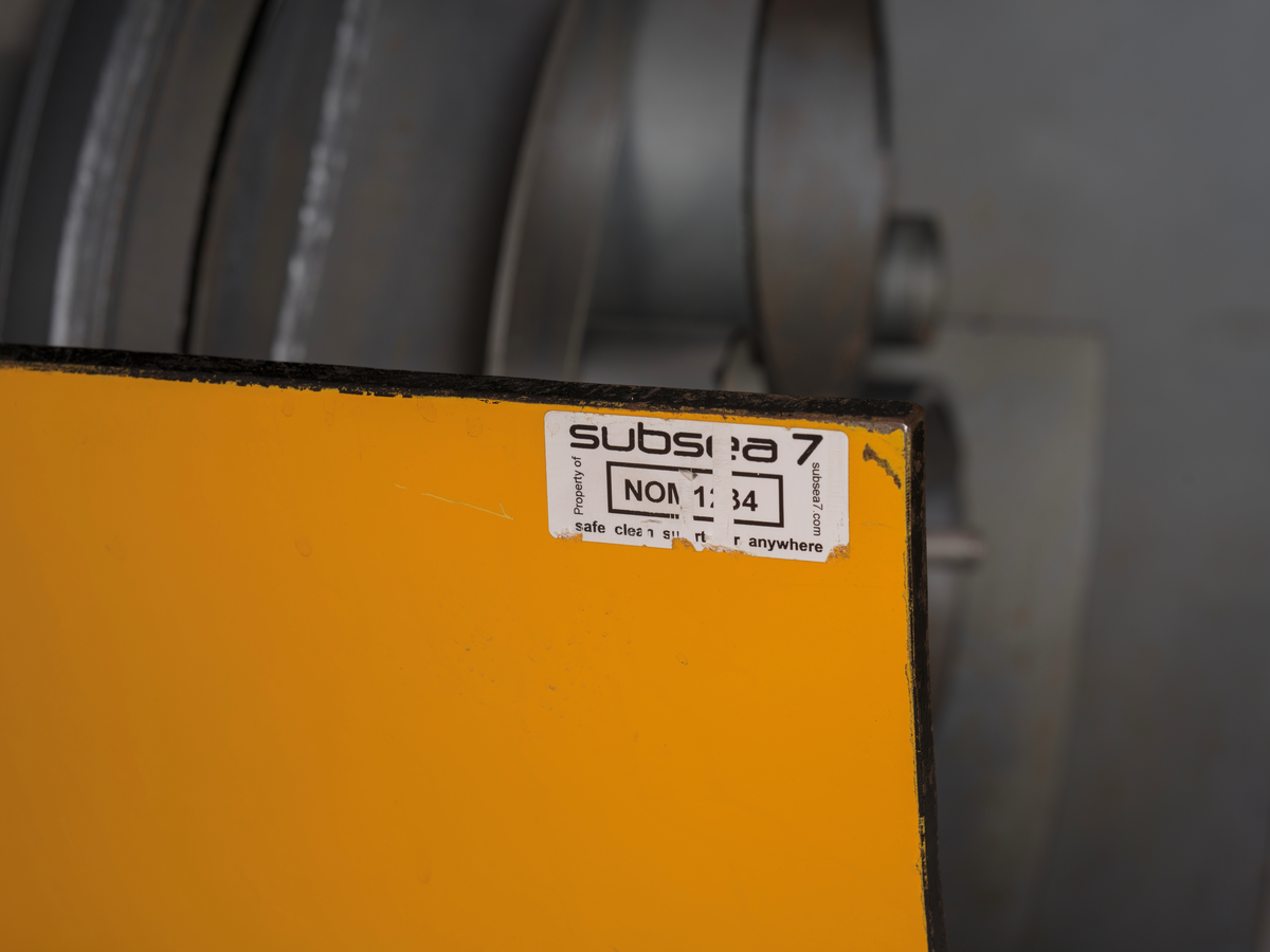 Utstillingsmodell bestående av flere rør som er buntet sammen innvendig i et større rør. Modellen er identisk med rørbunt som ble tatt i bruk på havbunnen på Gullfaks Sør i 1998.