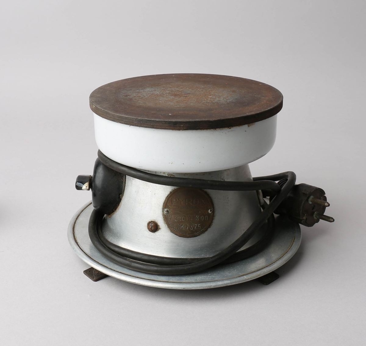 Elektrisk kokeapparat med én kokeplate, bryter og ledning med stikkontakt