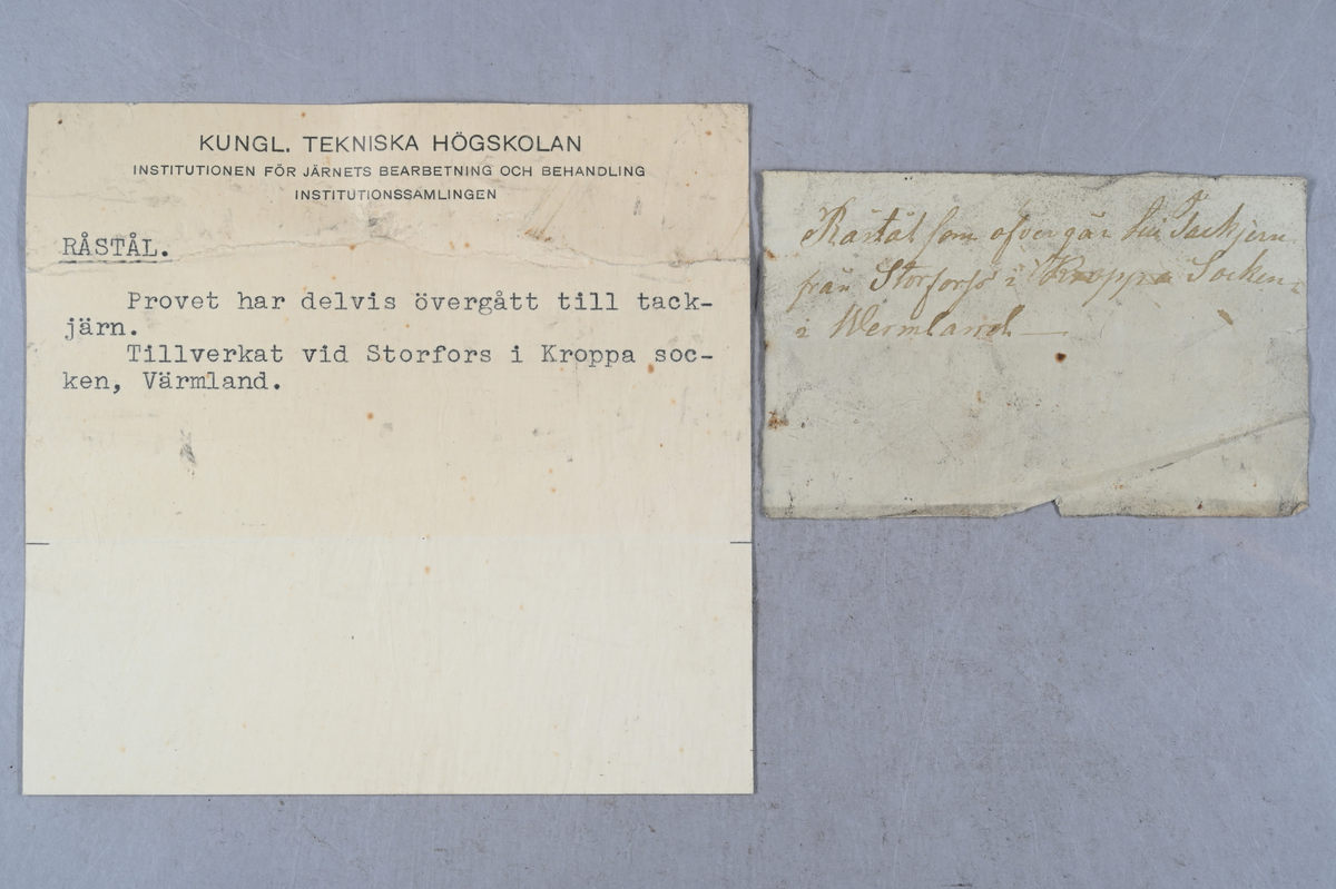 Två prover på råstål som delvis har övergått till tackjärn. Tillverkade vid Storfors i Kroppa socken, Värmland. Tillhörande lappar med samma notering.