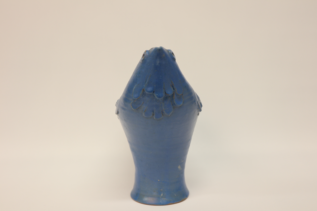 Blå vase inspirert av gauken.